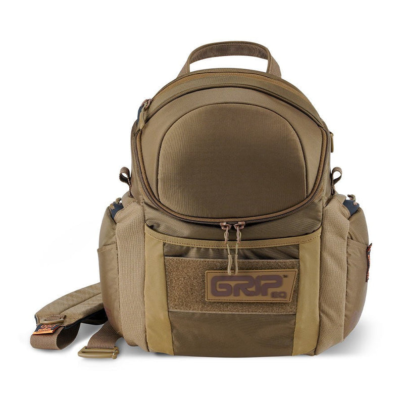 Olive green grip eq g2 series disc golf bag, with a top handle, front zipper pocket, and velcro patch for a logo.