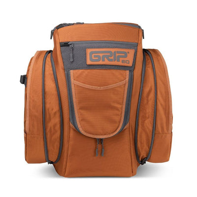 Orange and grey grip eq cx1 series disc golf bag with pockets and a zipper on the front.