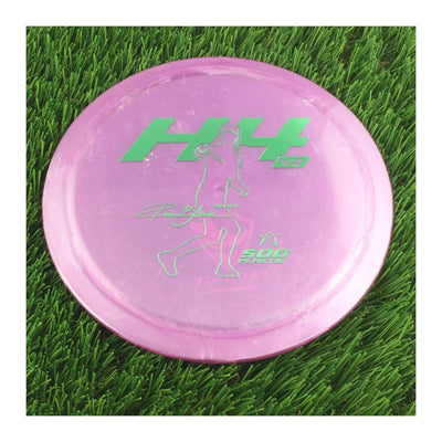 Solid purple Prodigy 500 H4 V2 disc with a glowing green Ragna Lewis 2021 Signature Series stamp.