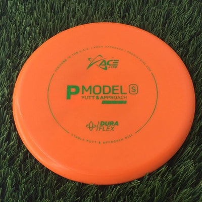 Solid orange Prodigy Ace Line DuraFlex P Model S disc with green lettering and logos.
