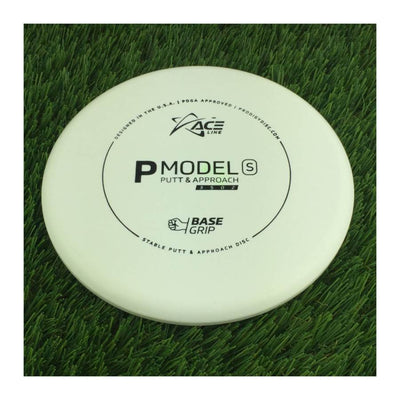 Solid white Prodigy Ace Line BaseGrip P Model S putter and approach disc with black stamp details.
