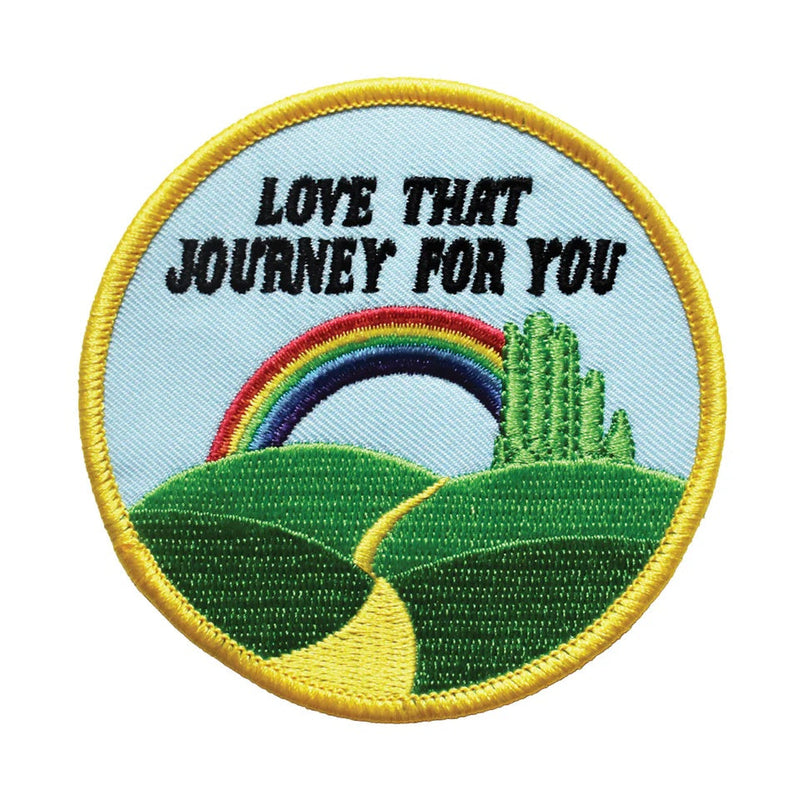 Retrograde circular iron-on patch with a yellow brick road, rainbow, The Emerald City, and "LOVE THAT JOURNEY FOR YOU" text.