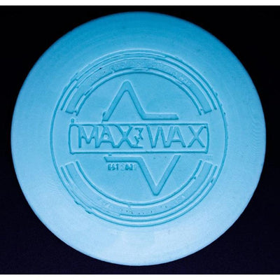 A round, light blue dg max wax mini grip wax with "max wax" embossed at the center, glowing in the dark.