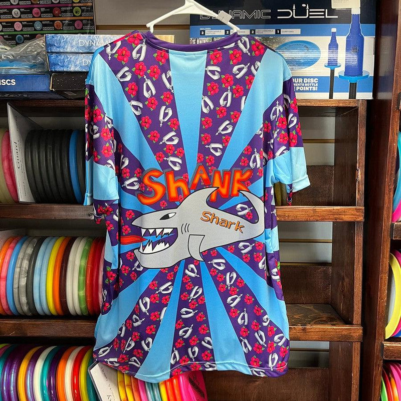 Purple and blue "Shank Shark" jersey with red flowers and a toothy grey shark with an orange tongue.