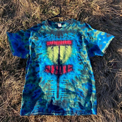 Blue and green tie-dye adult t-shirt featuring a disc golf basket graphic in yellow and red.