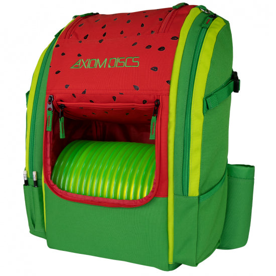 Watermelon-themed axiom voyager backpack, red and green with black seed details, holding lime green discs.
