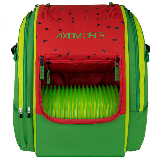 Watermelon-themed axiom voyager lite se disc golf backpack, red with black seeds, lime green trim, filled with bright green.