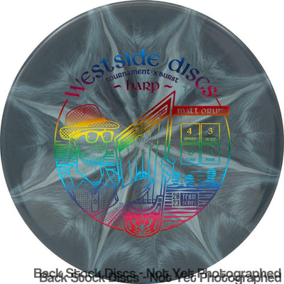 Westside Discs Tournament-X Burst Harp in a swirled dark gray and white with a rainbow foil Matt Orum playing harp stamp.