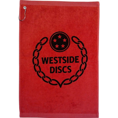 Red Westside Discs towel with black chain graphic and "WESTSIDE DISCS" text, plus a silver grommet and hook.