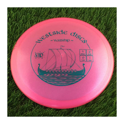 Translucent pink Westside Discs VIP Glimmer Warship disc with a teal warship stamp and flight numbers 5, 6, 0, 1.