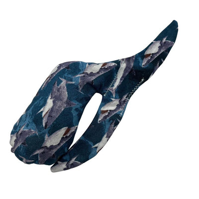 Whale Sacs grip bag in the "Great Whites" pattern features a dark blue fabric with numerous white and gray sharks.