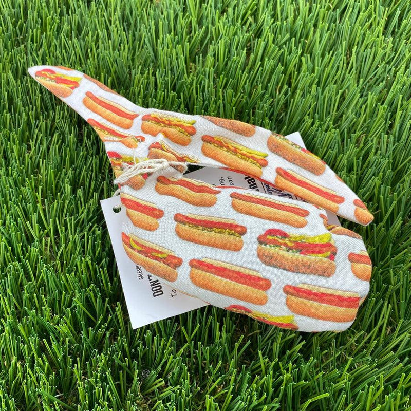 White fabric Whale Sac with a repeating hot dog pattern featuring mustard and relish.