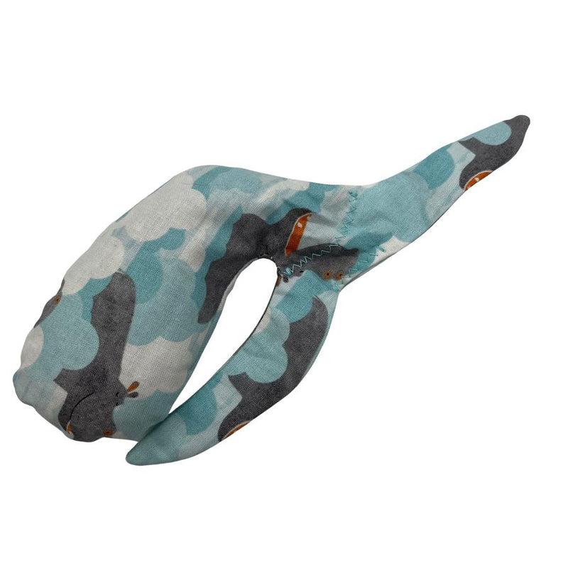 Happy Hippo Clouds Whale Sac grip bag in light blue, dark grey, and white cloud patterns with brown hippo accents.
