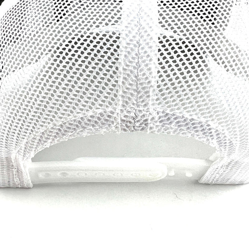 Back view of a Yupoong Axiom snapback trucker hat with a white mesh body and an adjustable snap closure.