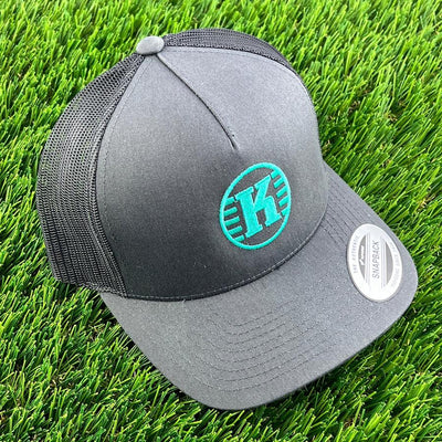 Charcoal gray Yupoong Kastaplast Snapback meshback hat featuring a round teal K logo on the front.
