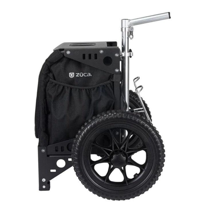 Black Züca Compact Cart with large rugged wheels and a silver telescopic handle.