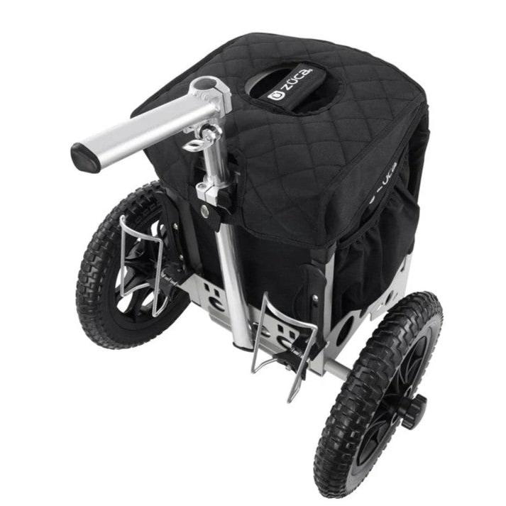 Black Zuca compact seat cushion cart with a quilted top, silver aluminum frame, and large treaded wheels.