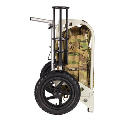 Black multi-use ZUCA pole holder attached to the light tan cart frame with a camouflage bag and black wheels.
