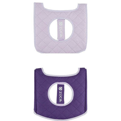 Two Zuca cart reversible seat cushions with quilted fabric in light lavender and dark purple.