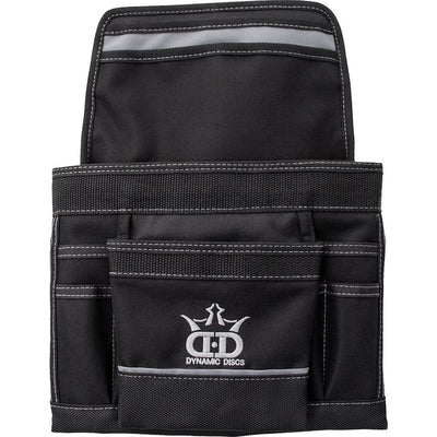 Black Zuca Dynamic Discs putter pouch with white stitching, a prominent white crown logo, and grey reflective strips.