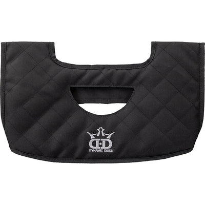 Black quilted Zuca Dynamic Discs seat cushion with a white embroidered logo and a cut-out for backpack cart handles.