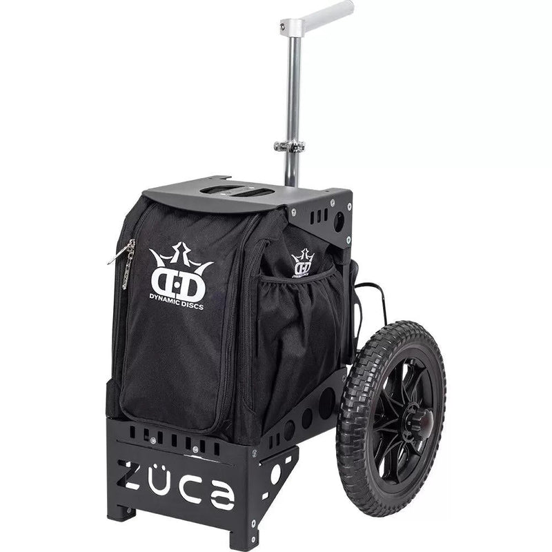 Black Dynamic Discs Zuca Compact Cart with textured wheels, a black fabric bag, and a silver adjustable handle.