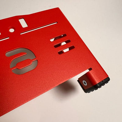 Zuca Front Wrapper backpack large disc golf cart in matte red with an exposed black rubber foot.