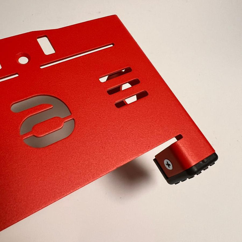 Zuca Front Wrapper backpack large disc golf cart in matte red with an exposed black rubber foot.