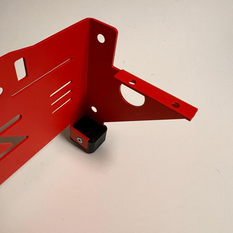 Red Zuca front wrapper backpack large disc golf cart attachment with visible holes and a black connector.