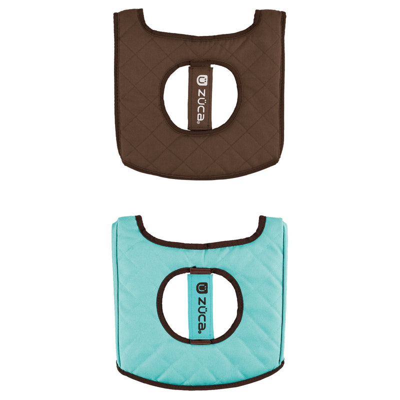 Quilted brown and turquoise ZUCA reversible seat cushions are shown, each with a centered circular cutout and logo strap.