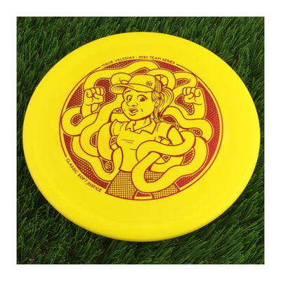 Dynamic Discs Classic Soft Justice with Macie Velediaz 2023 Team Series Stamp - 174g - Solid Yellow