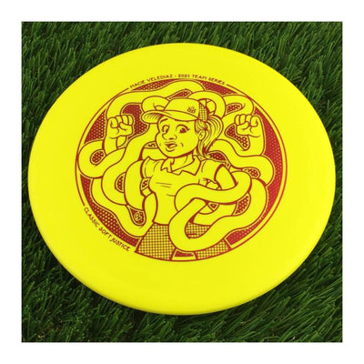 Dynamic Discs Classic Soft Justice with Macie Velediaz 2023 Team Series Stamp - 174g - Solid Yellow