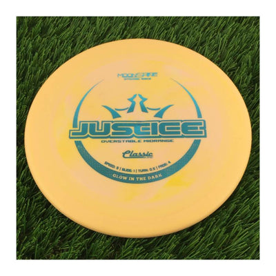 Dynamic Discs Classic Blend Moonshine Glow Justice with Glow in the Dark Stamp - 176g - Solid Pale Orange